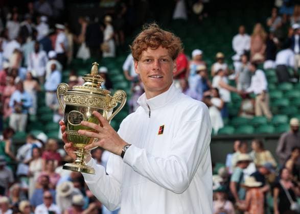 13th July 2025; All England Lawn Tennis and Croquet Club, London, England; Wimbledon Tennis Tournament, Day 14; Jannik Sinner (ITA) lifts the Gentlemen& x2019;s Singles Trophy to become the 2025 Wimbledon Gentlemen& x2019;s Single Champion after defeating Carlos Alcaraz (ESP) by 4-6 6-4 6-4 6-4  ActionPlus12813505 JohnxPatrickxFletcher