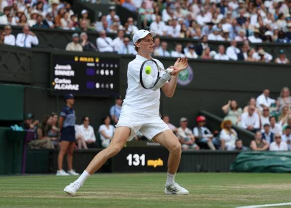 13th July 2025; All England Lawn Tennis and Croquet Club, London, England; Wimbledon Tennis Tournament, Day 14; Jannik Sinner (ITA) with a forehand shot to Carlos Alcaraz (ESP) during the Gentlemen s singles final match  ActionPlus12813529 JohnxPatrickxFletcher