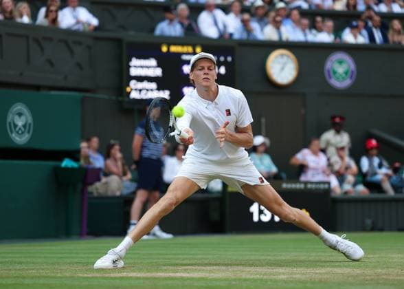 13th July 2025; All England Lawn Tennis and Croquet Club, London, England; Wimbledon Tennis Tournament, Day 14; Jannik Sinner (ITA) with a forehand shot to Carlos Alcaraz (ESP) during the Gentlemen s singles final match  ActionPlus12813522 JohnxPatrickxFletcher