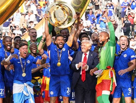 Football: Club World Cup Chelsea players celebrate, as U.S. President Donald Trump (3rd from R) looks on, after beating Paris Saint-Germain in the Club World Cup final at MetLife Stadium in East Rutherford, New Jersey, on July 13, 2025.  A14AA0004722123P