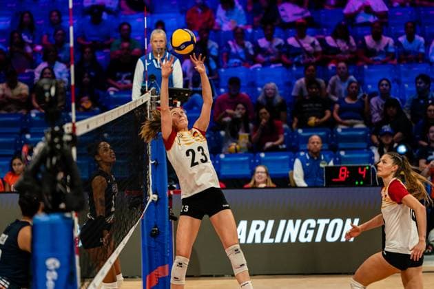 (250714) -- ARLINGTON, July 14, 2025 -- Sarah Straube (L) of Germany passes the ball during the pool 8 match between Germany and Dominican Republic at the Women s Volleyball Nations League (VNL) 2025 in Arlington, the United States, July 13, 2025. (Photo by Xinhua) (SP)U.S.-ARLINGTON-VOLLEYBALL-NATIONS LEAGUE-WOMEN ChenxChen 