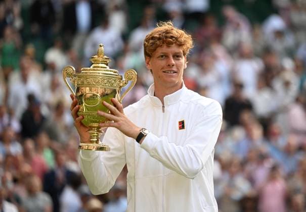(250714) -- LONDON, July 14, 2025 -- Jannik Sinner poses with the trophy after winning the men s singles final between Carlos Alcaraz of Spain and Jannik Sinner of Italy at the Wimbledon Tennis Championships in London, Britain, July 13, 2025. ) (SP)BRITAIN-LONDON-TENNIS-WIMBLEDON-MEN S SINGLES-FINAL LixYing 