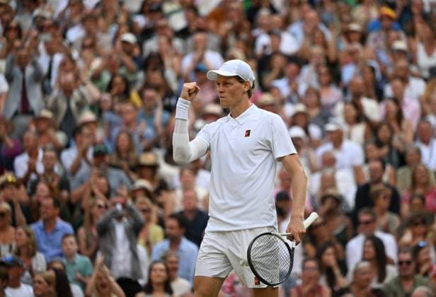 (250714) -- LONDON, July 14, 2025 -- Jannik Sinner celebrates scoring during the men s singles final between Carlos Alcaraz of Spain and Jannik Sinner of Italy at the Wimbledon Tennis Championships in London, Britain, July 13, 2025. ) (SP)BRITAIN-LONDON-TENNIS-WIMBLEDON-MEN S SINGLES-FINAL LixYing 