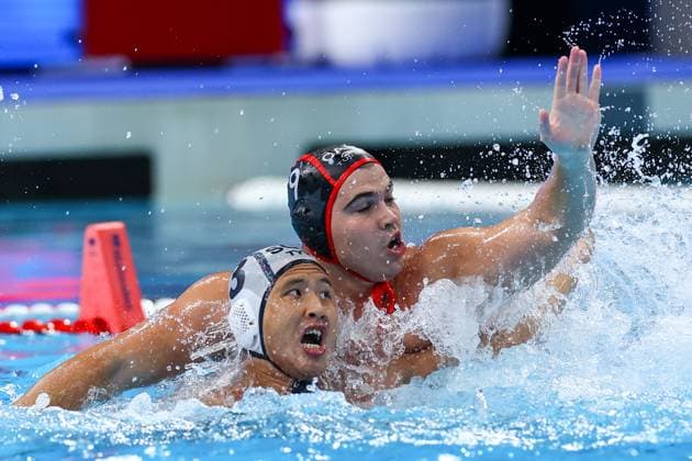 Aleksa Gardijan of Canada, Wai Chun Fong of Singapore Singapore v Canada, Water polo, Wasserball Singapore 2025 World Aquatics Championships, OCBC Aquatic Centre, July 14, 2025, Singapore, Singapore.