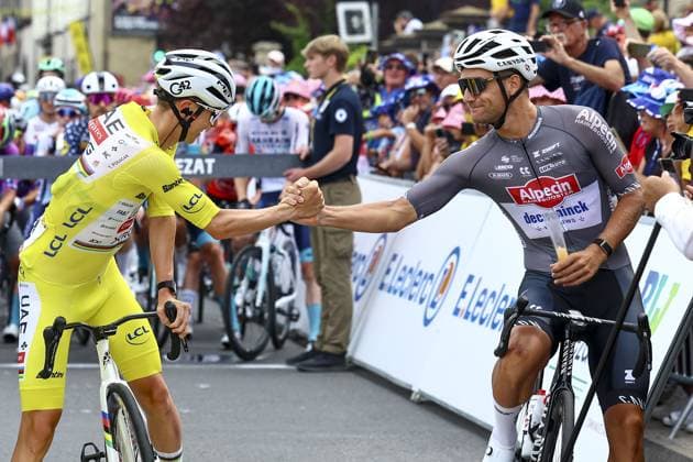Slovenian Tadej Pogacar of UAE Team Emirates and Belgian Jonas Rickaert of Alpecin-Deceuninck pictured at the start of stage 10 of the 2025 Tour de France cycling, from Ennezat to Le Mont-Dore Puy de Sancy (169 km), on Monday 14 July 2025 in France. The 112th edition of the Tour de France starts on Saturday 5 July in Lille, France, and will finish in Paris, France on the 27th of July. DAVIDxPINTENS  x129231325x