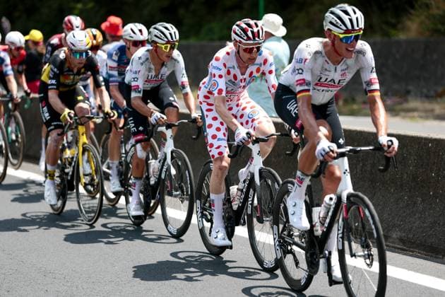 Belgian Tim Wellens of UAE Team Emirates and German Nils Politt of UAE Team Emirates pictured in action during stage 10 of the 2025 Tour de France cycling, from Ennezat to Le Mont-Dore Puy de Sancy (169 km), on Monday 14 July 2025 in France. The 112th edition of the Tour de France starts on Saturday 5 July in Lille, France, and will finish in Paris, France on the 27th of July. POOLxLUCAxBETTINI  x129238358x