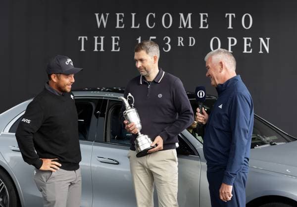 14th July 2025; Royal Portrush Golf Club, Portrush, County Antrim, Northern Ireland; The Open Golf Championship Practice Day 2; 2024 Open Champion Xander Schauffele (USA) returns the Claret Jug trophy to Chief Executive of the R&amp;A Mark Darbon  ActionPlus12813843 DavidxBlunsden