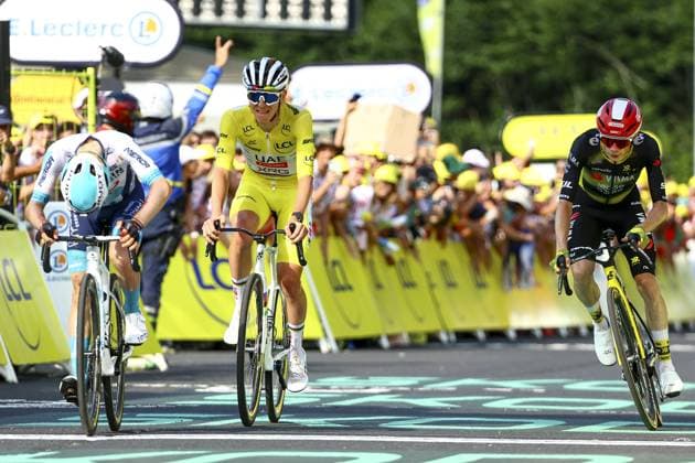 Slovenian Tadej Pogacar of UAE Team Emirates and Danish Jonas Vingegaard Hansen of Team Visma-Lease a Bike pictured in action during stage 10 of the 2025 Tour de France cycling, from Ennezat to Le Mont-Dore Puy de Sancy (169 km), on Monday 14 July 2025 in France. The 112th edition of the Tour de France starts on Saturday 5 July in Lille, France, and will finish in Paris, France on the 27th of July. DAVIDxPINTENS  x129256728x