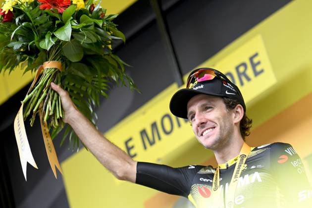 British Simon Yates of Team Visma Lease a Bike celebrates on the podium after winning stage 10 of the 2025 Tour de France cycling, from Ennezat to Le Mont-Dore Puy de Sancy (169 km), on Monday 14 July 2025 in France. The 112th edition of the Tour de France starts on Saturday 5 July in Lille, France, and will finish in Paris, France on the 27th of July. JASPERxJACOBS  x129256797x