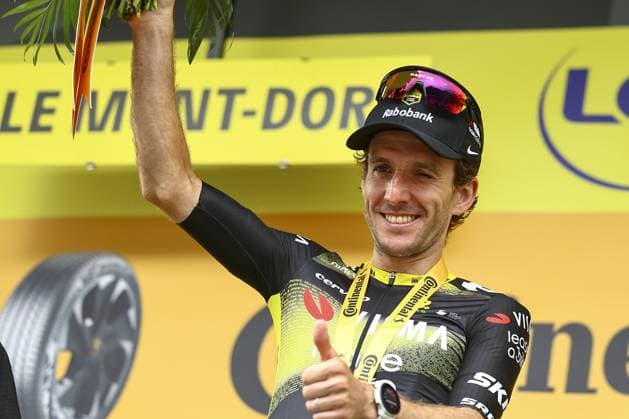 British Simon Philip Yates of Team Visma-Lease a Bike celebrates on the podium after winning stage 10 of the 2025 Tour de France cycling, from Ennezat to Le Mont-Dore Puy de Sancy (169 km), on Monday 14 July 2025 in France. The 112th edition of the Tour de France starts on Saturday 5 July in Lille, France, and will finish in Paris, France on the 27th of July. DAVIDxPINTENS  x129256810x