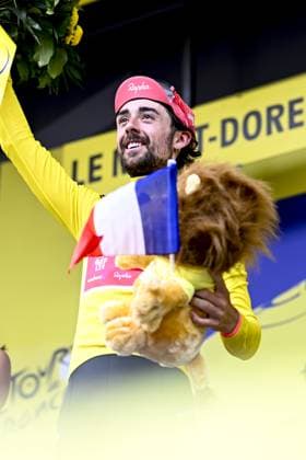 Irish Ben Healy of EF Education-EasyPost celebrates on the podium in the yellow jersey of leader in the overall ranking after stage 10 of the 2025 Tour de France cycling, from Ennezat to Le Mont-Dore Puy de Sancy (169 km), on Monday 14 July 2025 in France. The 112th edition of the Tour de France starts on Saturday 5 July in Lille, France, and will finish in Paris, France on the 27th of July. JASPERxJACOBS  x129256840x
