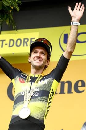 British Simon Philip Yates of Team Visma-Lease a Bike celebrates on the podium after winning stage 10 of the 2025 Tour de France cycling, from Ennezat to Le Mont-Dore Puy de Sancy (169 km), on Monday 14 July 2025 in France. The 112th edition of the Tour de France starts on Saturday 5 July in Lille, France, and will finish in Paris, France on the 27th of July. DAVIDxPINTENS  x129257247x