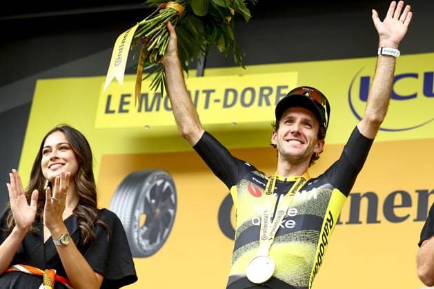 British Simon Yates of Team Visma Lease a Bike celebrates on the podium after winning stage 10 of the 2025 Tour de France cycling, from Ennezat to Le Mont-Dore Puy de Sancy (169 km), on Monday 14 July 2025 in France. The 112th edition of the Tour de France starts on Saturday 5 July in Lille, France, and will finish in Paris, France on the 27th of July. DAVIDxPINTENS  x129257689x