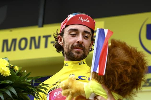 Irish Ben Healy of EF Education-EasyPost celebrates on the podium in the yellow jersey of leader in the overall ranking after stage 10 of the 2025 Tour de France cycling, from Ennezat to Le Mont-Dore Puy de Sancy (169 km), on Monday 14 July 2025 in France. The 112th edition of the Tour de France starts on Saturday 5 July in Lille, France, and will finish in Paris, France on the 27th of July. DAVIDxPINTENS  x129259510x