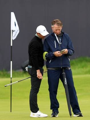 15th July 2025; Royal Portrush Golf Club, Portrush, County Antrim, Northern Ireland; The Open Golf Championship Practice Day 3; Rory McIlroy (NIR) consults putting coach Brad Faxon on the 12th green  ActionPlus12814056 DavidxBlunsden