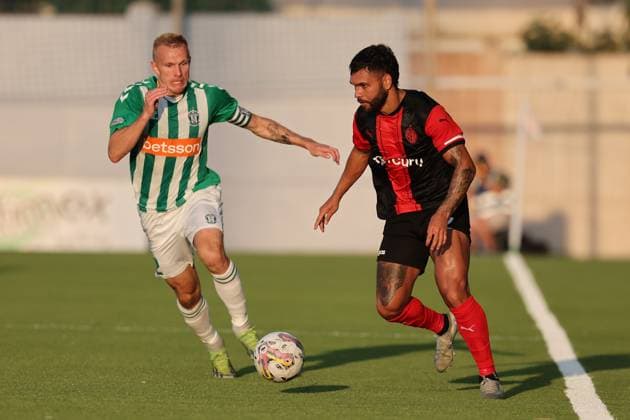 Rafael Compri (right) of Hamrun Spartans is in action against Ovidijus Verbickas of Zalgiris during the UEFA Champions League First qualifying round, 2nd leg soccer match between Hamrun Spartans FC and FK Zalgiris at the Centenary Stadium, in Ta Qali, Malta, 15 July 2025. UEFA Champions League - Hamrun Spartans FC v FK Zalgiris
