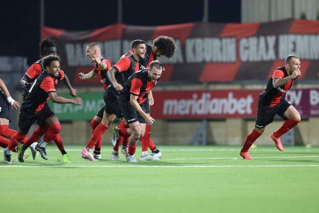 Hamrun Spartans players react in celebration after the decisive penalty goal in the penalty shoot out during the UEFA Champions League First qualifying round, 2nd leg soccer match between Hamrun Spartans FC and FK Zalgiris at the Centenary Stadium, in Ta Qali, Malta, 15 July 2025. UEFA Champions League - Hamrun Spartans FC v FK Zalgiris