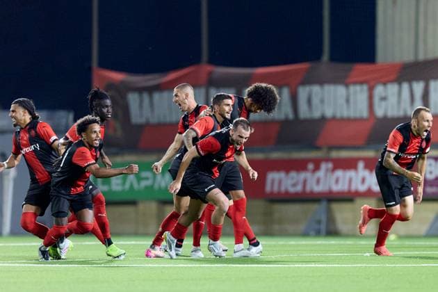 Hamrun Spartans players react in celebration after the decisive penalty scored by Jovan Cadjenovic (not in picture) during the penalty shoot out, after the UEFA Champions League First qualifying round, 2nd leg soccer match between Hamrun Spartans FC and FK Zalgiris at the Centenary Stadium, in Ta Qali, Malta, 15 July 2025. Hamrun Spartans became the first Maltese soccer team to advance to the UEFA Champions League Second qualifying round. UEFA Champions League - Hamrun Spartans FC v FK Zalgiris
