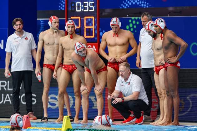 headcoach Pat Oaten of Canada, Reuel D Souza of Canada, Brody Mc Knight of Canada, David Lapins of Canada Canada v Brazil, Water polo, Wasserball Singapore 2025 World Aquatics Championships, OCBC Aquatic Centre, July 16, 2025, Singapore, Singapore.