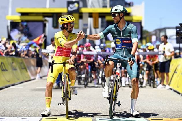 Irish Ben Healy of EF Education-EasyPost and Italian Jonathan Milan of Lidl-Trek pictured at the start of stage 11 of the 2025 Tour de France cycling, from and to Toulouse (154km), on Wednesday 16 July 2025 in France. The 112th edition of the Tour de France starts on Saturday 5 July in Lille, France, and will finish in Paris, France on the 27th of July. JASPERxJACOBS  x129370111x