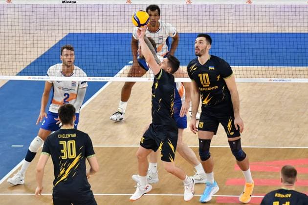 Ljubljana, Slovenia, 16th July 2024: Vitalii Shchytkov of Ukraine (C) in action against Wessel Keemink of Netherlands (L) during the IVNL Volleyball Nations League, Week 3 match, between Ukraine and Netherlands at Arena Stozice, Ljubljana, Slovenia. (Natasa Kupljenik SPP) Copyright: xNatasaxKupljenikx xSPPx SPP_1015280