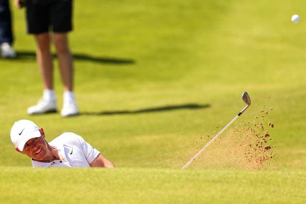 The 153rd Open Championship, Royal Portrush Golf Club, Co. Antrim 16 7 2025 Rory McIlroy chips out of a bunker on the 8th Rory McIlroy 16 7 2025  Copyright: x INPHO BenxBradyx BB3_8194