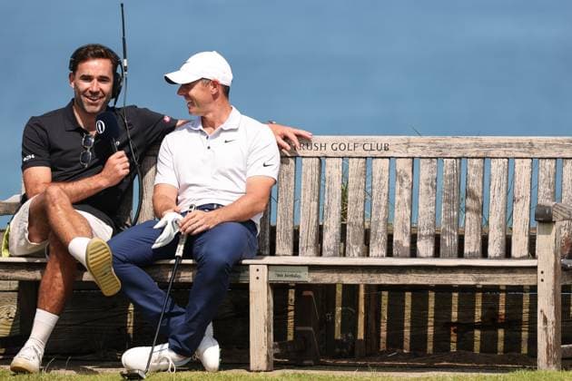 The 153rd Open Championship, Royal Portrush Golf Club, Co. Antrim 16 7 2025 Rory McIlroy speaks to George Harper Jr. Rory McIlroy speaks to George Harper Jr. 16 7 2025  Copyright: x INPHO BenxBradyx BB3_7366