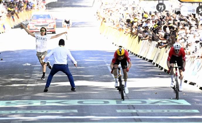 A demonstrator pictured at the finish of stage 11 of the 2025 Tour de France cycling, from and to Toulouse (154km), on Wednesday 16 July 2025 in France. The 112th edition of the Tour de France starts on Saturday 5 July in Lille, France, and will finish in Paris, France on the 27th of July. JASPERxJACOBS  x129379900x