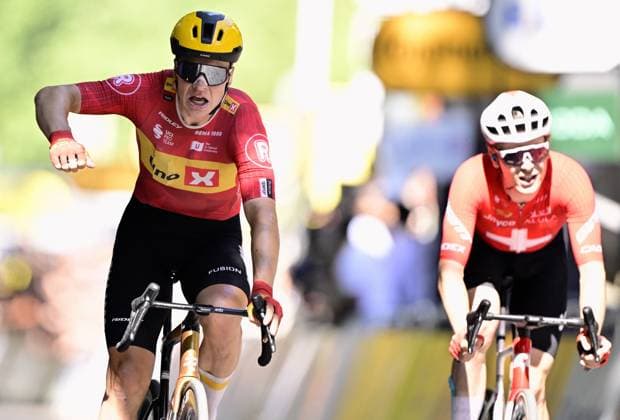Norwegian Jonas Abrahamsen of Uno-X Mobility wins ahead of Swiss Mauro Schmid of Team Jayco AlUla in stage 11 of the 2025 Tour de France cycling, from and to Toulouse (154km), on Wednesday 16 July 2025 in France. The 112th edition of the Tour de France starts on Saturday 5 July in Lille, France, and will finish in Paris, France on the 27th of July. DIRKxWAEM  x129380254x