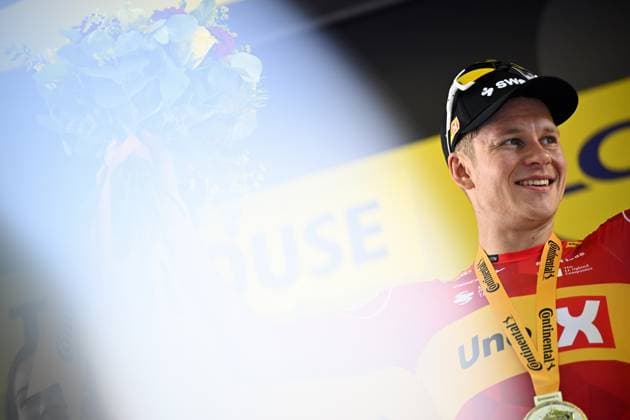 Norwegian Jonas Abrahamsen of Uno-X Mobility celebrates on the podium after winning stage 11 of the 2025 Tour de France cycling, from and to Toulouse (154km), on Wednesday 16 July 2025 in France. The 112th edition of the Tour de France starts on Saturday 5 July in Lille, France, and will finish in Paris, France on the 27th of July. JASPERxJACOBS  x129381454x