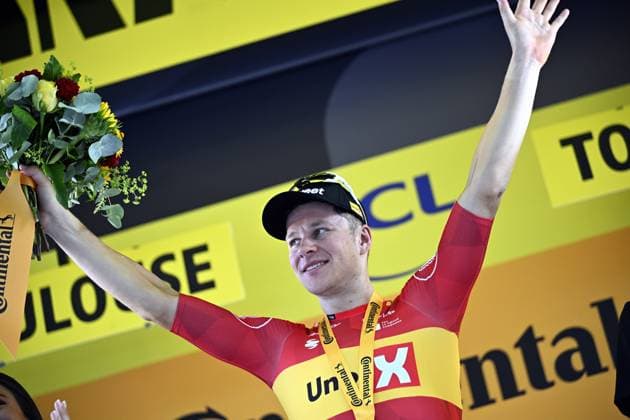 Norwegian Jonas Abrahamsen of Uno-X Mobility celebrates on the podium after winning stage 11 of the 2025 Tour de France cycling, from and to Toulouse (154km), on Wednesday 16 July 2025 in France. The 112th edition of the Tour de France starts on Saturday 5 July in Lille, France, and will finish in Paris, France on the 27th of July. JASPERxJACOBS  x129381459x
