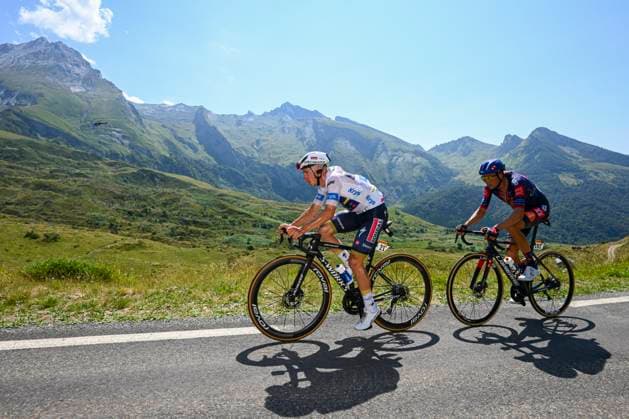 Tour de France 2025 Stage 12 HAUTACAM, FRANCE - JULY 17 : Barguil Warren (FRA) of Team Picnic PostNL, Evenepoel Remco (BEL) of Soudal - Quick Step in action during stage 12 of the 112th edition of Tour de France an UCI World Tour 2.UWT cycling road race stage for Men Elite of 181 km with start in Auch and finish in Hautacam on July 17, 2025 in Hautacam, France, 17 07 2025 ( Motordriver Kenny Verfaillie - Hautacam France  Copyright: xVincentxKalutx