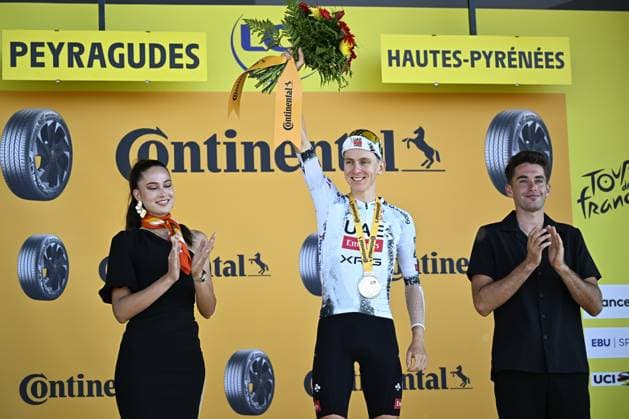 Slovenian Tadej Pogacar of UAE Team Emirates celebrates on the podium after winning stage 13 of the 2025 Tour de France cycling race, an 11km individual time trial from Loudenvielle to Peyragudes, on Friday 18 July 2025 in France. The 112th edition of the Tour de France starts on Saturday 5 July in Lille, France, and will finish in Paris, France on the 27th of July. JASPERxJACOBS  x129502183x