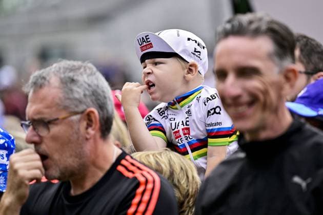 A young fan of and Slovenian Tadej Pogacar of UAE Team Emirates pictured at the start of stage 14 of the 2025 Tour de France cycling race, from Pau to Luchon-Superbagneres (183 km), on Saturday 19 July 2025 in France. The 112th edition of the Tour de France starts on Saturday 5 July in Lille, France, and will finish in Paris, France on the 27th of July. DIRKxWAEM  x129555752x