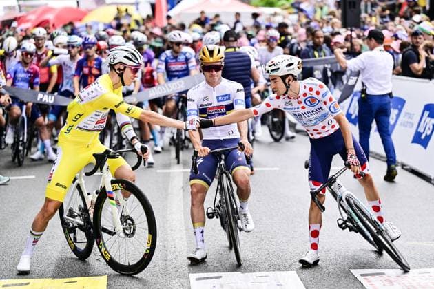 Slovenian Tadej Pogacar of UAE Team Emirates, Belgian Remco Evenepoel of Soudal Quick-Step and French Lenny Martinez of Bahrain Victorious pictured at the start of stage 14 of the 2025 Tour de France cycling race, from Pau to Luchon-Superbagneres (183 km), on Saturday 19 July 2025 in France. The 112th edition of the Tour de France starts on Saturday 5 July in Lille, France, and will finish in Paris, France on the 27th of July. DIRKxWAEM  x129556431x