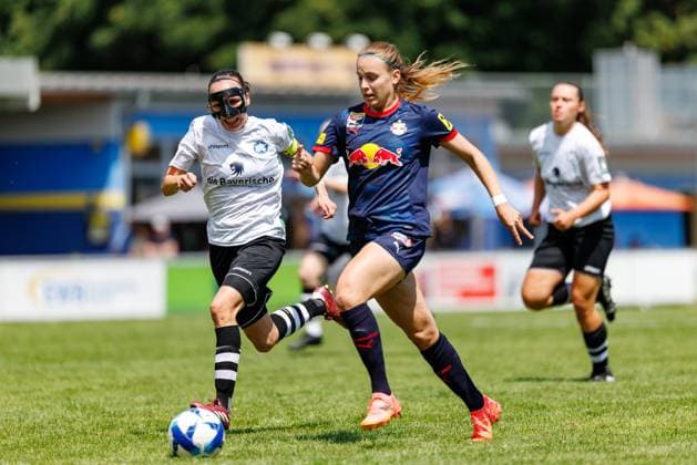 Sonja Kolb 12, FFC Wacker München and Emelie Kobler 22, FC Red Bull Salzburg during the match FFC Wacker München v FC Red Bull Salzburg, Soccer, Women, Regionalliga Süd, 2025 2026, Test match on 19 07 2025 in Fürstenfeldbruck, Stadion a d Klosterstraße Bayern Germany
