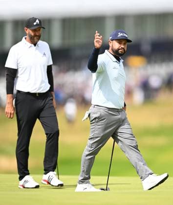 J.J. Spaun celebrates holing a putt on the 1st green for a birdie playing with Dustin Johnson The Open Championship, Day Three, Golf, Royal Portrush Golf Club, Portrush, Northern Ireland, UK - 19 Jul 2025 EDITORIAL USE ONLY No use with unauthorised audio, video, data, fixture lists, club league logos or live services. Online in-match use limited to 120 images, no video emulation. No use in betting, games or single club league player publications. Copyright: xGreigxCowie Shutterstockx 15403239b