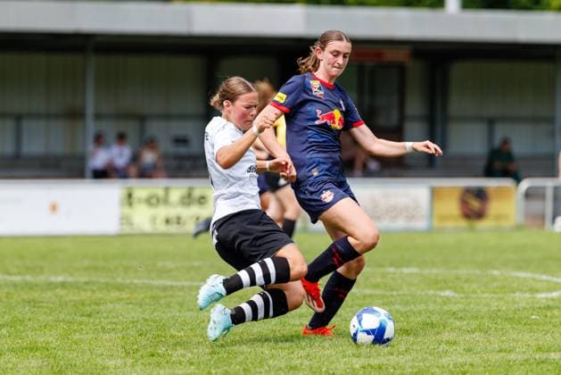 Jana Schuster 6, FFC Wacker München and Greta Spinn 8, FC Red Bull Salzburg at the match FFC Wacker München v FC Red Bull Salzburg, Soccer, Women, Regionalliga Süd, 2025 2026, Test match on 19 07 2025 in Fürstenfeldbruck, Stadion a d Klosterstraße Bayern Germany