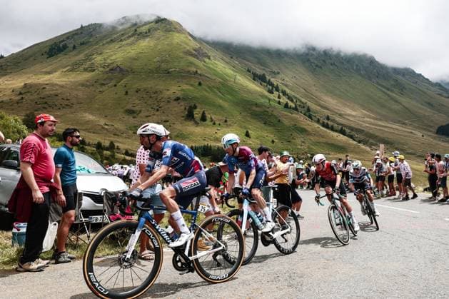 French Valentin Paret-Peintre of Soudal-Quick Step and Canadian Michael Woods of Israel-Premier Tech pictured in action during stage 14 of the 2025 Tour de France cycling race, from Pau to Luchon-Superbagneres (183 km), on Saturday 19 July 2025 in France. The 112th edition of the Tour de France starts on Saturday 5 July in Lille, France, and will finish in Paris, France on the 27th of July. POOLxLUCAxBETTINI  x129566117x