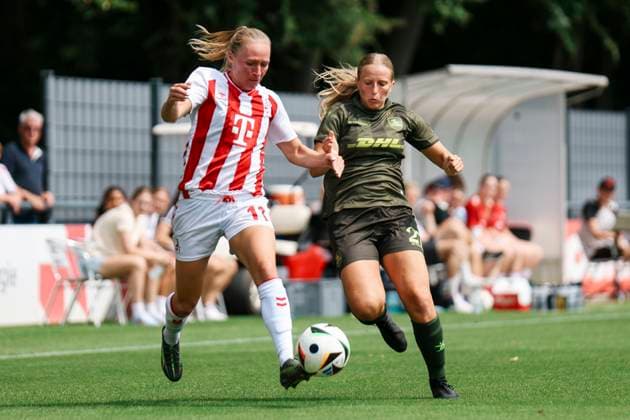 Test match 1 FC Köln OH Leuven 19 07 2025 Pauline Bremer 1 FC Köln, 11 in a duel with Alixe Bosteels OH Leuven Women, 27 during the test match 1 FC Köln OH Leuven Köln, Geißbockheim on 19 07 2025 Copyright: xBEAUTIFULxSPORTS Freisenx
