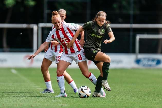 Test match 1 FC Köln OH Leuven 19 07 2025 Laura Vogt 1 FC Köln, 8 in a duel during the test match 1 FC Köln OH Leuven Cologne, Geißbockheim on 19 07 2025 Copyright: xBEAUTIFULxSPORTS Freisenx