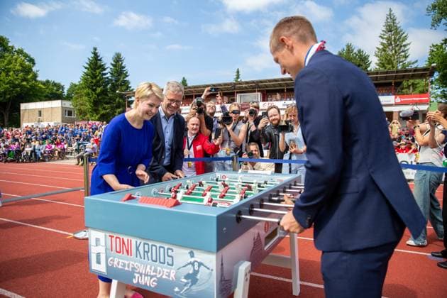 Manuela Schwesig and Dr Stefan Fassbinder at the unique foosball table that will be auctioned off for a good cause GER, award ceremony, Order of Merit, Toni Kroos, foundation, honor, Greifswald, Mecklenburg-Vorpommern