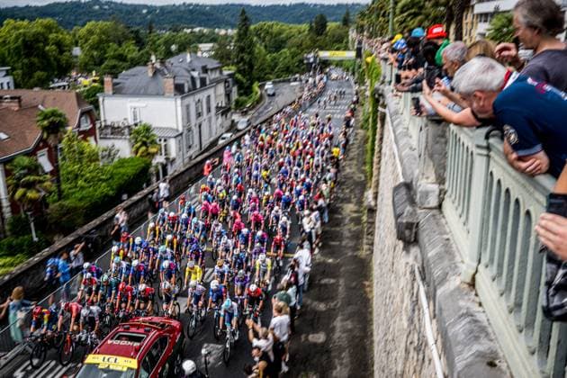 The pack of riders pictured in action during pictured at the start of stage 14 of the 2025 Tour de France cycling race, from Pau to Luchon-Superbagneres (183 km), on Saturday 19 July 2025 in France. The 112th edition of the Tour de France starts on Saturday 5 July in Lille, France, and will finish in Paris, France on the 27th of July. JASPERxJACOBS  x129590980x