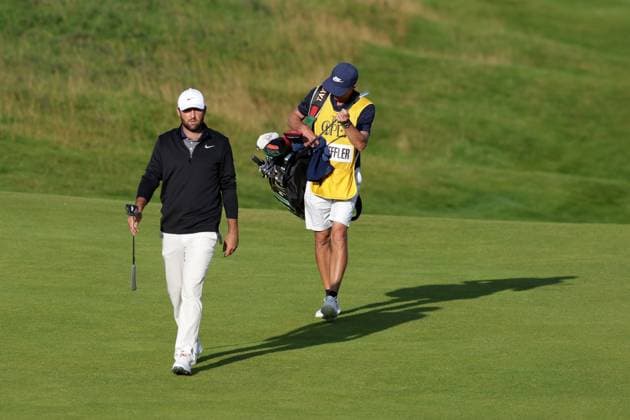19th July 2025; Royal Portrush Golf Club, Portrush, County Antrim, Northern Ireland; The Open Golf Championship Round 3; Scottie Scheffler (USA) walks up the 18th fairway  ActionPlus12815304 DavidxBlunsden