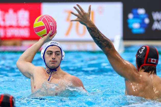 Matei Lutescu of Romania, Bogdan Djerkovic of Canada Romania v Canada, Water polo, Wasserball Singapore 2025 World Aquatics Championships, OCBC Aquatic Centre, July 20, 2025, Singapore, Singapore.