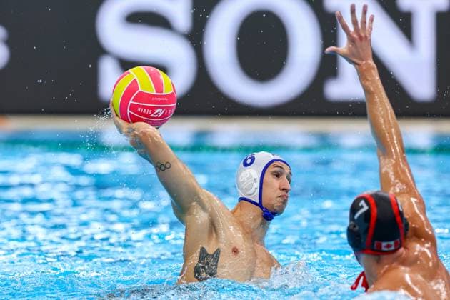Andrei Prioteasa of Romania, Roko Pozaric of Canada Romania v Canada, Water polo, Wasserball Singapore 2025 World Aquatics Championships, OCBC Aquatic Centre, July 20, 2025, Singapore, Singapore.
