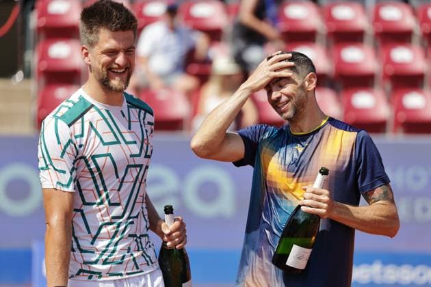 Sander Arends, Netherlands, left and Guido Andreozzi, Argentina, right celebrate the win of the men s doubles final on Sunday where they faced Adam Pavlasek, Czech Republic, and Jan Zielinski, Poland, during the Nordea Open tennis tournament in Bastad, Sweden on the 20th of July 2025 BASTAD SWEDEN x9200x  Copyright: xBjörnxLarssonxRosvall TTx NORDEA OPEN 2025 FINAL DOUBLES