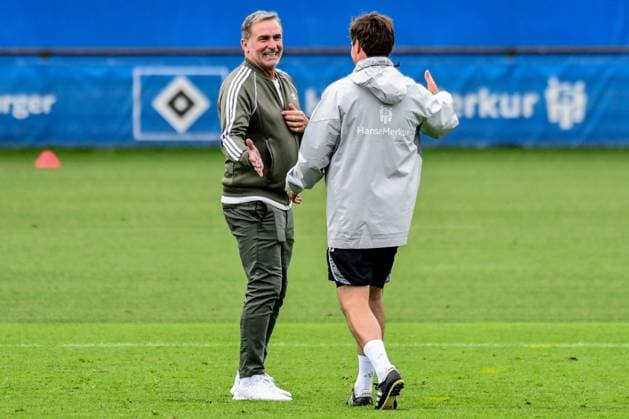 Head of Sport Stefan Kuntz welcomes coach Merlin Polzin HSV laughing Germany , Hamburg , Volksparkstadion , Football , 1 Bundesliga , Training of Hamburger SV