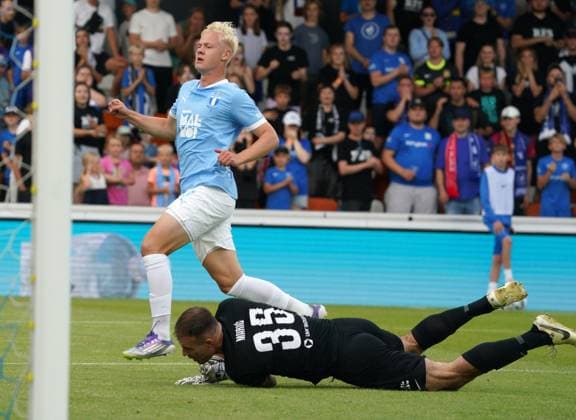 UEFA, UEFA Champions League, Champions League qualifying, soccer, football, RFS, Malmo FF Otto Rosengren, left, scores and against Marko Maric during their UEFA Champions League second qualifying round first leg soccer match between Latvia™s RFS and Sweden™s Malmo FF in Riga, Latvia, 22.07.2025. Riga Latvia Copyright: xRomanxKoksarovx RKO08588.JPG
