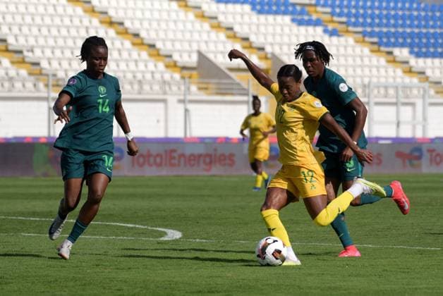 CASABLANCA, MOROCCO - JULY 20: Jermaine Seoposenwe of South Africa and Nigeria defenders during the 2025 Women s Africa Cup of Nations (WAFCON) Semi Finals match between Nigeria and South Africa at Stade Larbi Zaouli on July 20, 2025 in Casablanca, Morocco. Photo by Mansa Ayoola Copyright: xx